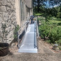 Lifeway Mobility technician finishes installation of wheelchair ramp in Kansas City