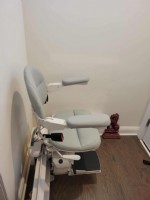 curved stairlift at bottom landing of staircase installed by Lifeway Mobility Philadelphia