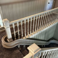 custom curved stairlift rail with 180 degree overrun in Indianapolis home from Lifeway Mobility