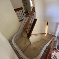 custom curved stairlift with 180 degree park at bottom landing from Lifeway Mobiliy San Diego