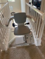 stair lift swiveled at top of staircase in home in Fishers Indiana