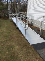 wheelchair ramp built around corner of home to backyard in Massachusetts