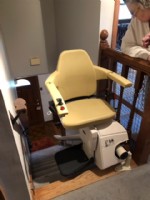 Curved stairlift wood floor carpeted stairs4