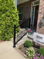 aluminum handrail installation on front porch stairs at Noblesville home
