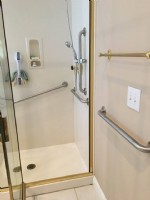 horizontal and vertical grab bars in bathroom in Indiana home