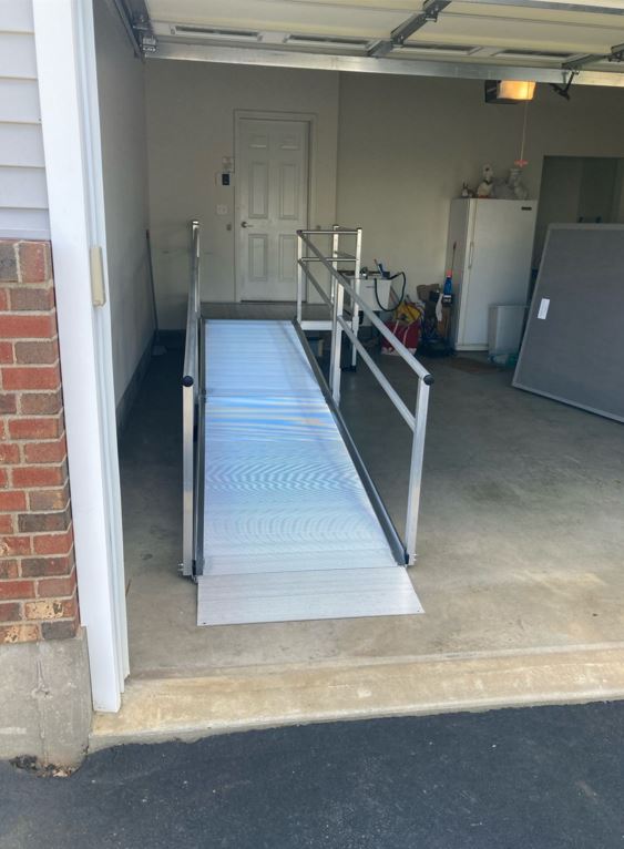 aluminum wheelchair ramp installed in garage by Lifeway Mobility