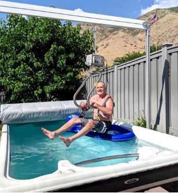 man transfers himself into exercise pool in CO
