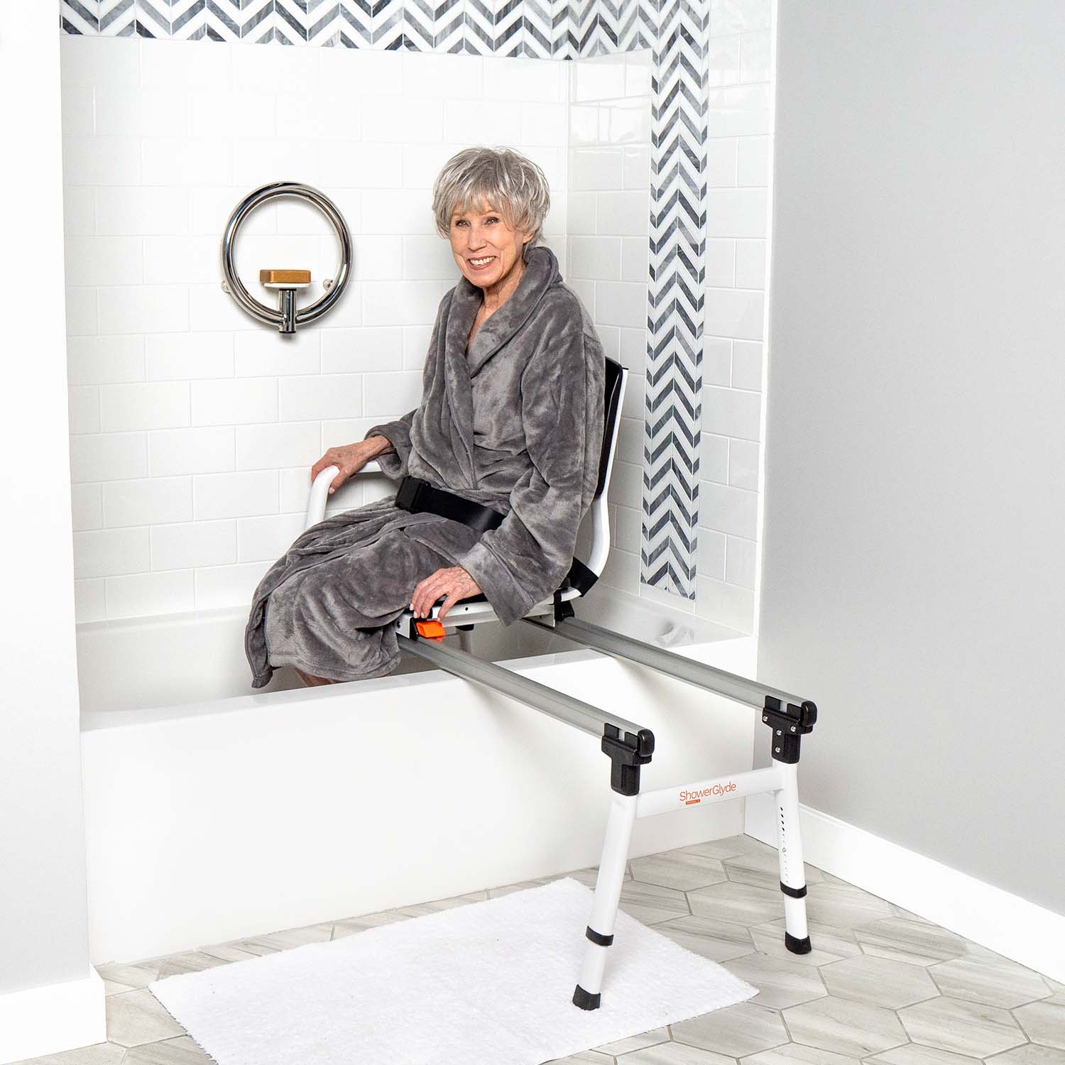 woman using shower seat to safely bath